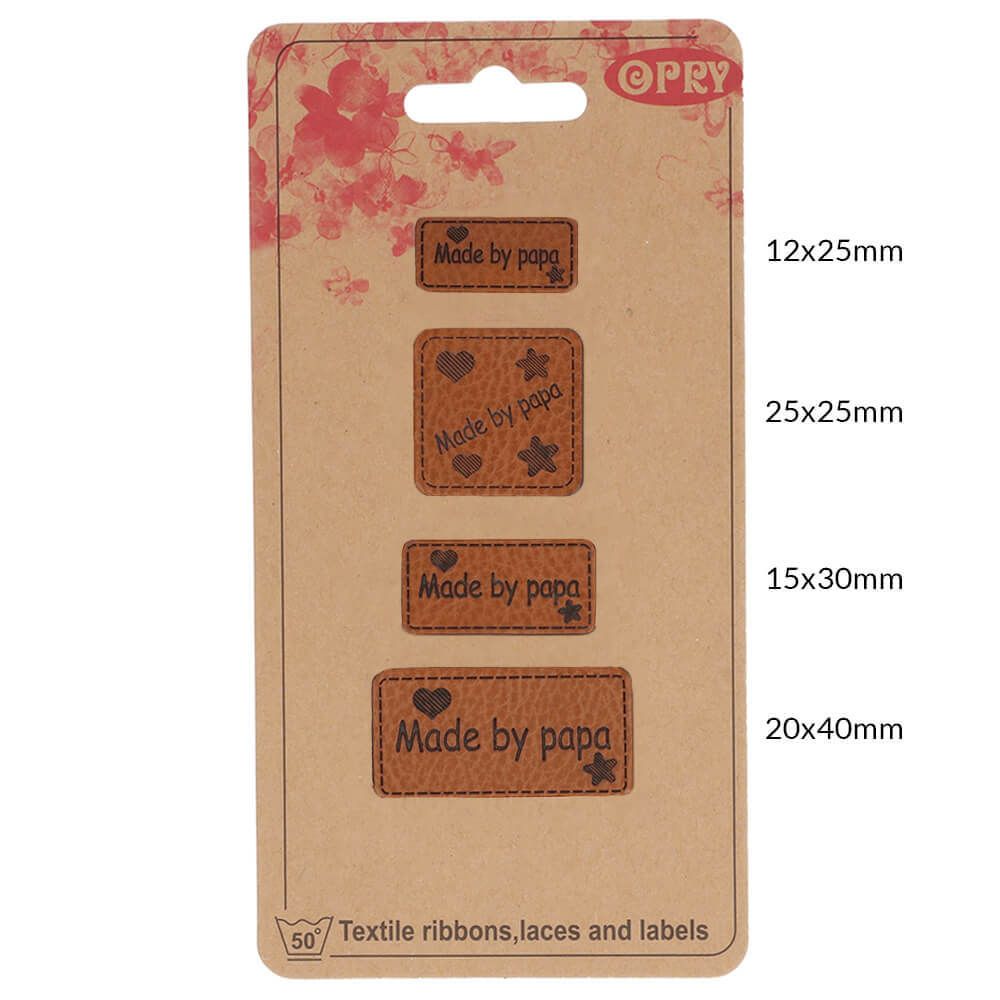 Vier Lederpatches in verschiedenen Größen mit dem Aufdruck Mady by Papa